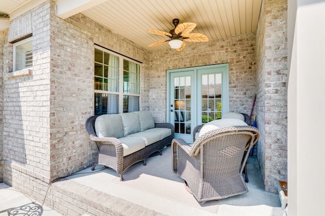 view of patio featuring ceiling fan, an outdoor hangout area, and french doors