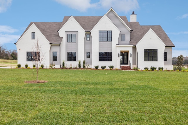 view of front of house with a front lawn