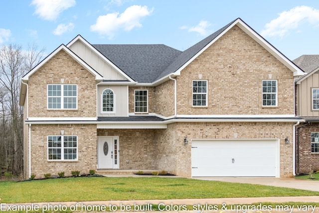 view of front of property featuring a garage and a front lawn