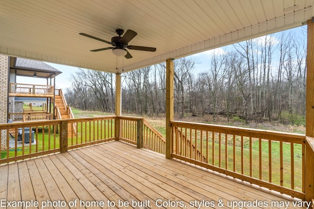 deck with central AC unit, a lawn, and ceiling fan