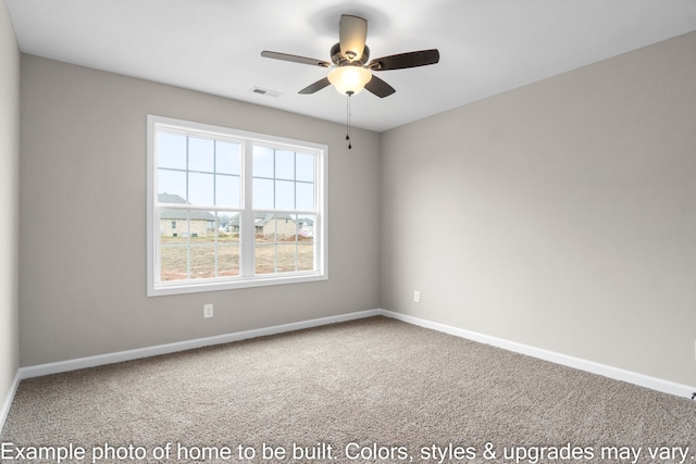 carpeted empty room featuring ceiling fan