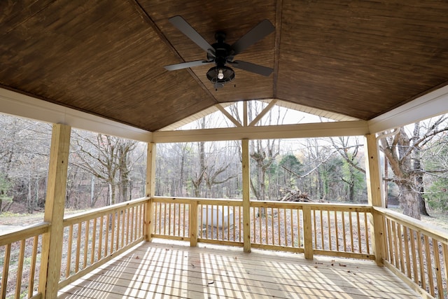 wooden deck featuring ceiling fan