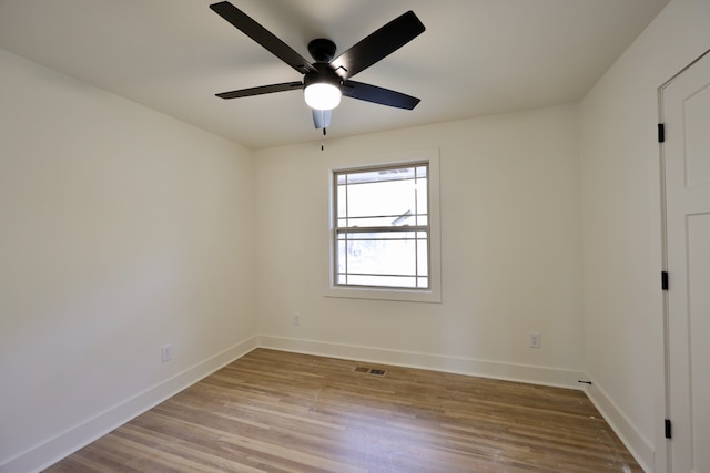 unfurnished room with light hardwood / wood-style floors and ceiling fan