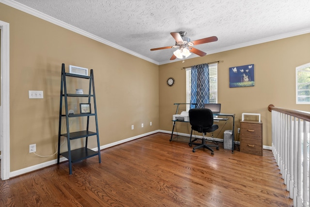 office space featuring hardwood / wood-style floors, a textured ceiling, ceiling fan, and crown molding