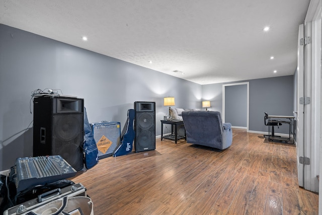 office space featuring hardwood / wood-style floors and a textured ceiling