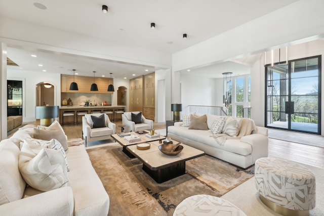 living room with light hardwood / wood-style flooring