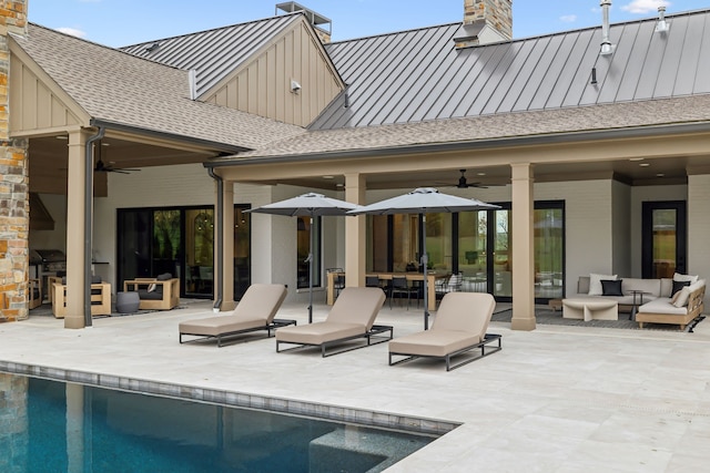 rear view of property with outdoor lounge area, ceiling fan, and a patio area