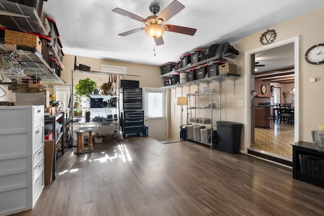 miscellaneous room with ceiling fan and dark hardwood / wood-style floors