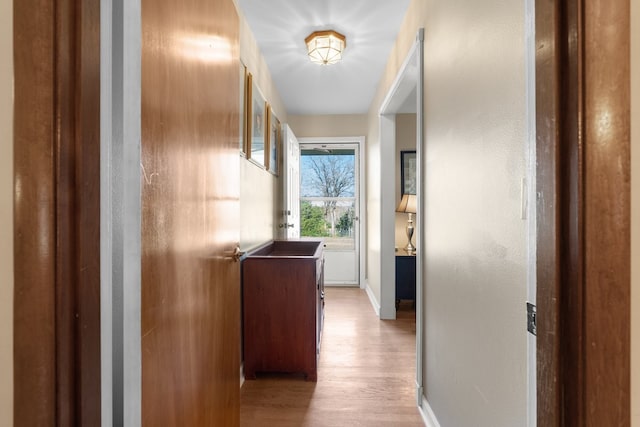 hallway featuring light hardwood / wood-style flooring