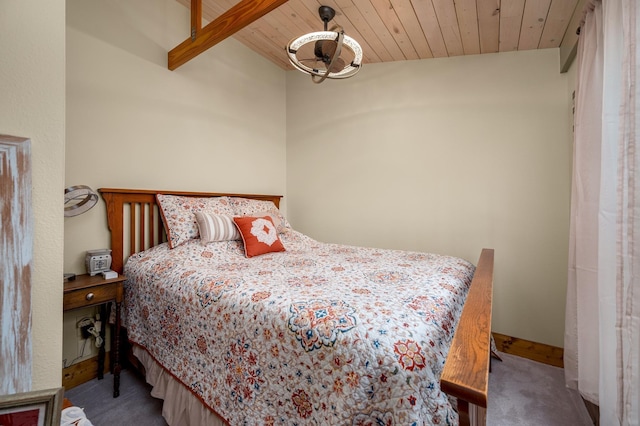 carpeted bedroom with wood ceiling