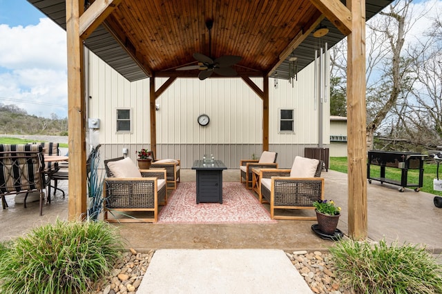 view of patio / terrace featuring an outdoor living space and ceiling fan