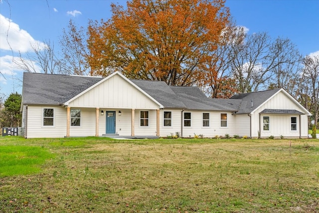 view of front of home featuring a porch and a front yard