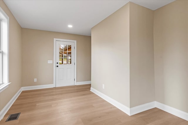 entrance foyer featuring light hardwood / wood-style flooring