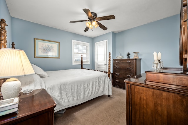 bedroom featuring light carpet and ceiling fan