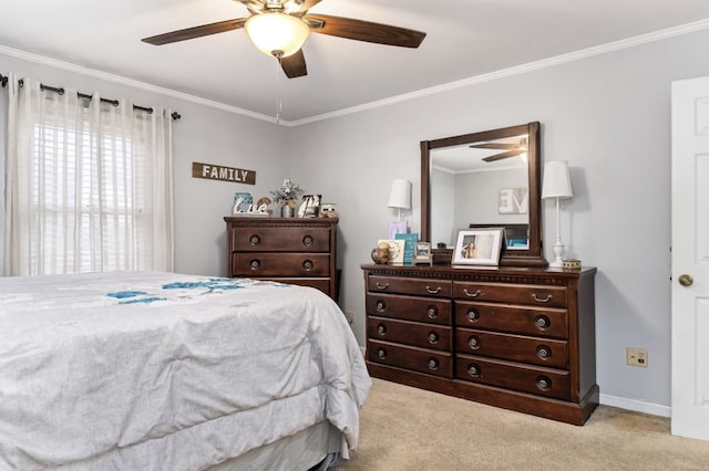 bedroom with light carpet, crown molding, baseboards, and ceiling fan