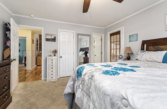 bedroom featuring light colored carpet, crown molding, and ceiling fan