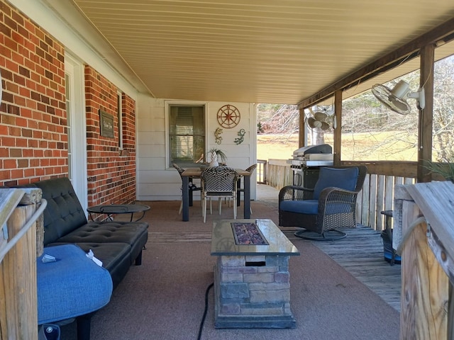 view of patio featuring a fire pit and grilling area