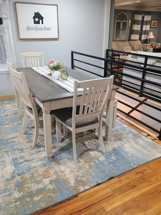 dining room with wood finished floors