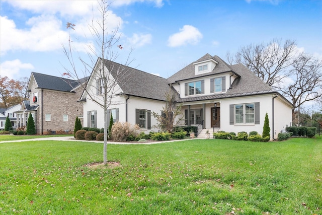 view of front of property featuring a front yard