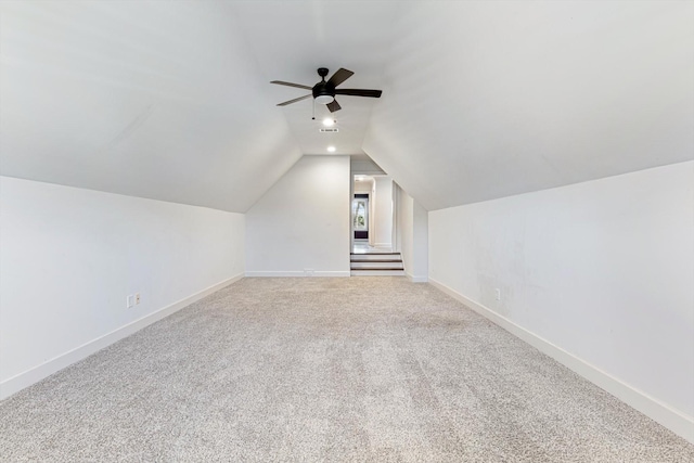 bonus room featuring ceiling fan, carpet, and vaulted ceiling