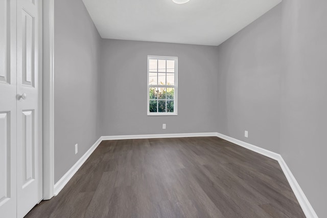 interior space with dark wood-type flooring