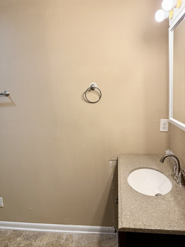 bathroom featuring tile patterned floors and sink