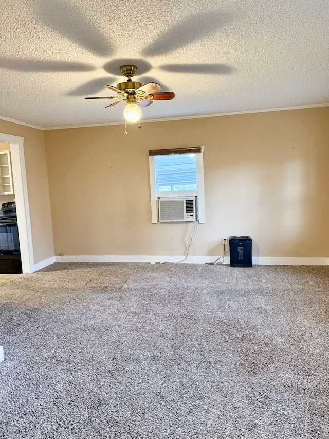 carpeted empty room featuring ceiling fan, cooling unit, crown molding, and a textured ceiling