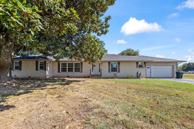 single story home featuring a front yard and a garage