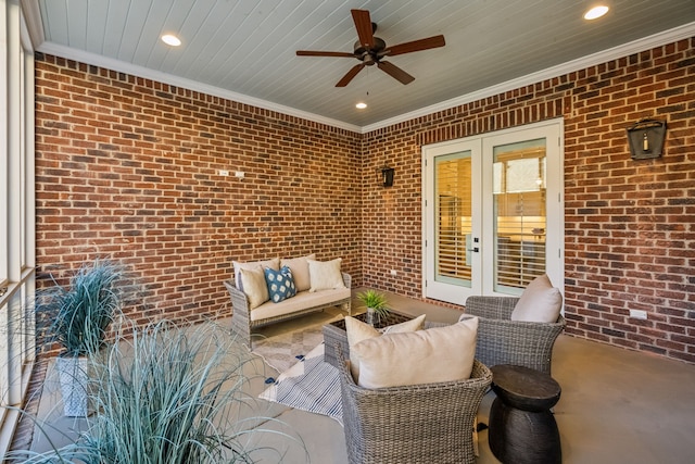 view of patio with ceiling fan, an outdoor living space, and french doors