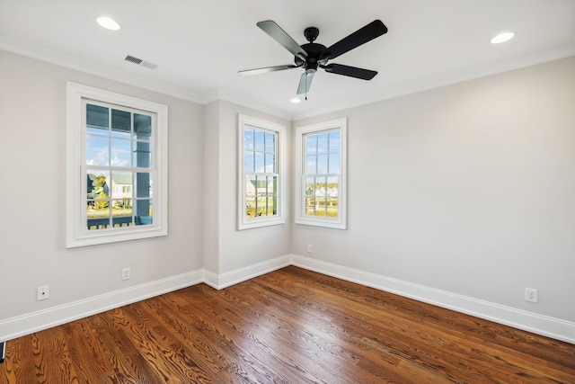 unfurnished room featuring hardwood / wood-style floors, ceiling fan, and crown molding