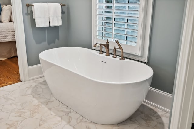 bathroom with a bathing tub