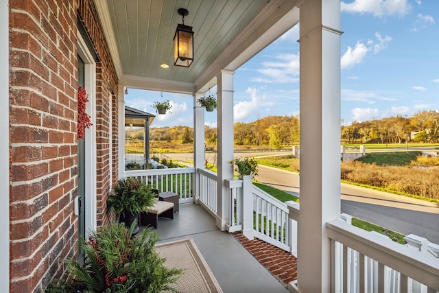 balcony featuring covered porch