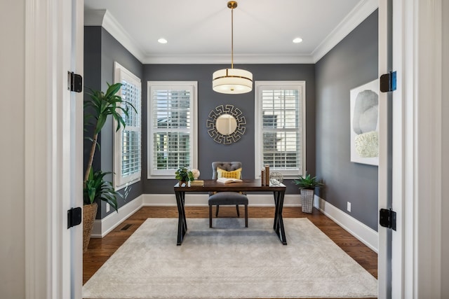 office area featuring dark hardwood / wood-style flooring and ornamental molding