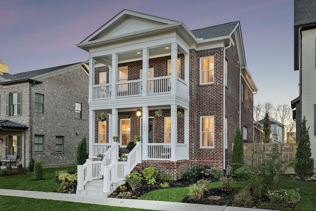 neoclassical / greek revival house with a porch