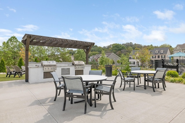 900 Vintage Green Ln Unit 301, Franklin, TN 37064 - view of patio featuring outdoor dining area, exterior kitchen, a residential view, and a pergola