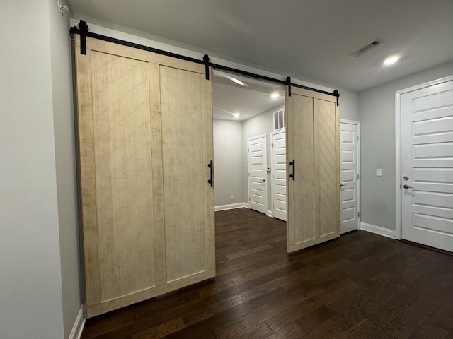 900 Vintage Green Ln Unit 301, Franklin, TN 37064 - entrance foyer featuring a barn door, dark wood-style floors, and recessed lighting
