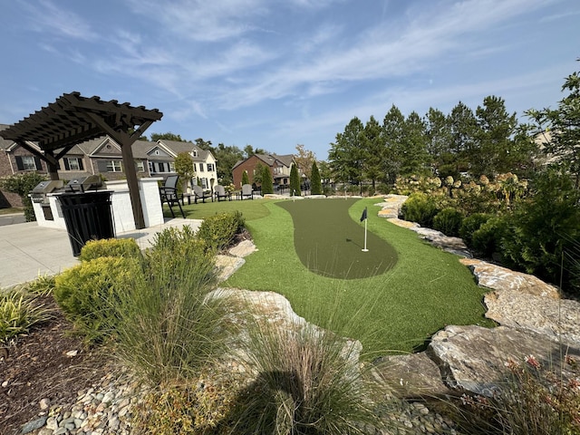 900 Vintage Green Ln Unit 301, Franklin, TN 37064 - surrounding community featuring a putting area, a pergola, and a residential view