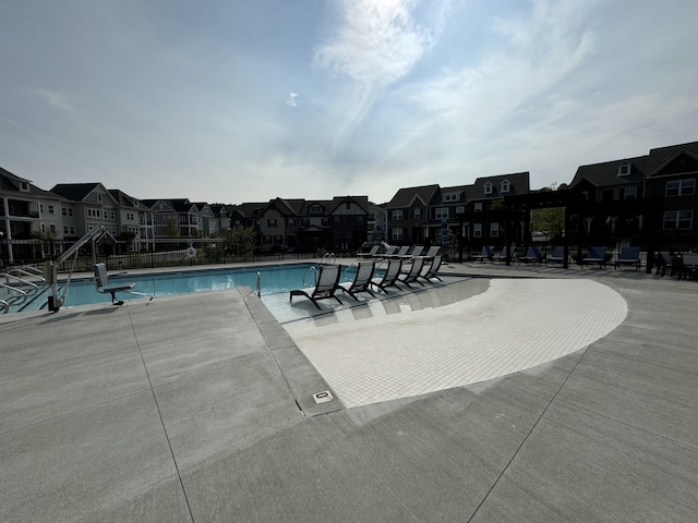 view of swimming pool featuring a patio