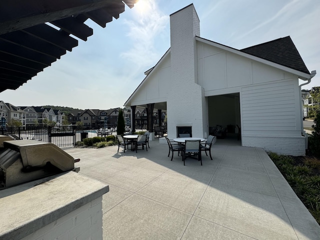 900 Vintage Green Ln Unit 301, Franklin, TN 37064 - view of patio featuring outdoor dining area and a residential view