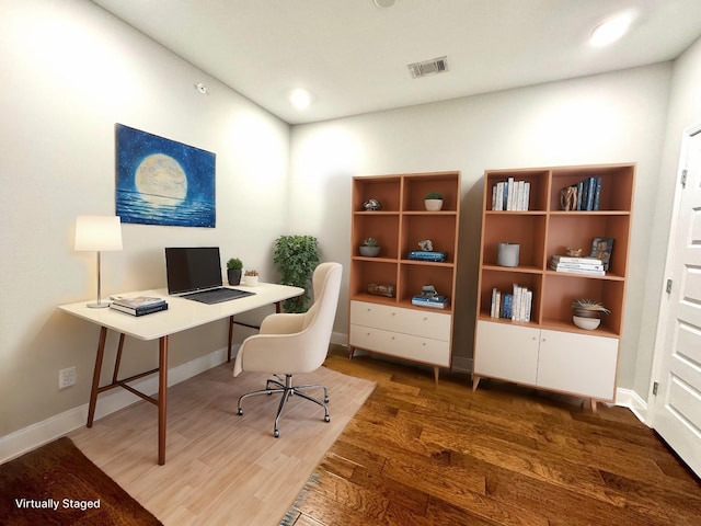 home office featuring dark wood-type flooring