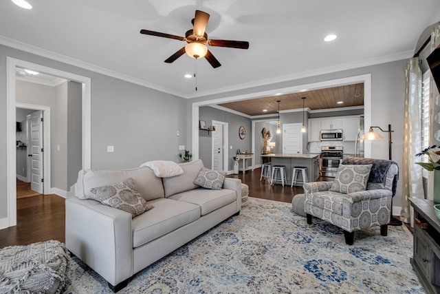 living room with dark wood-type flooring and crown molding