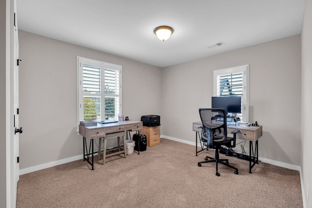 office area with light carpet