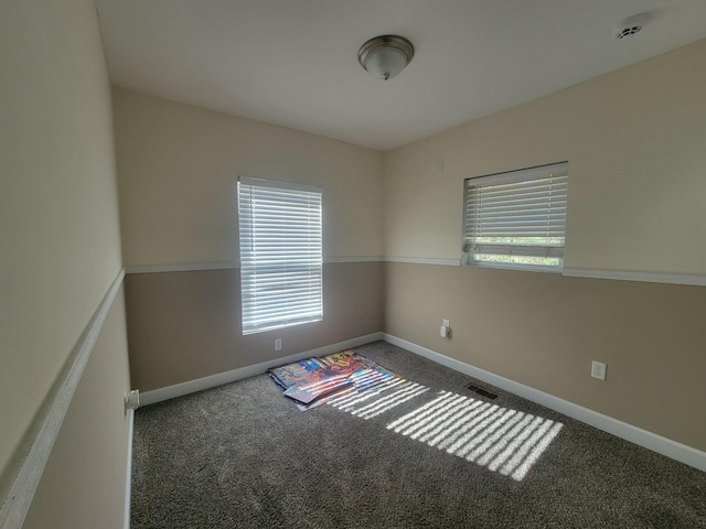 view of carpeted spare room