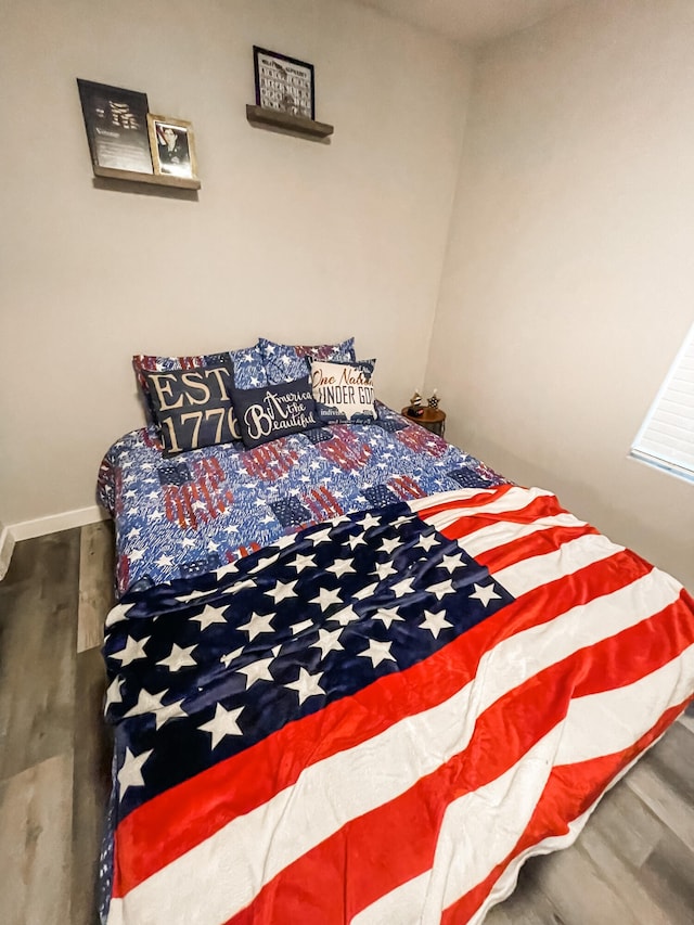 bedroom featuring hardwood / wood-style floors