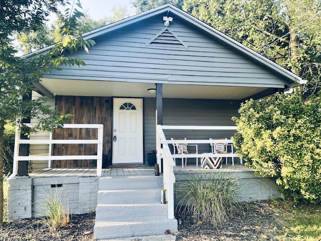 bungalow-style home with covered porch