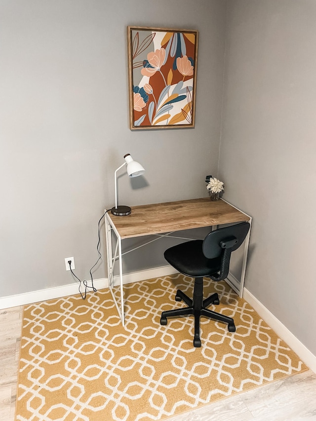 office space featuring hardwood / wood-style floors