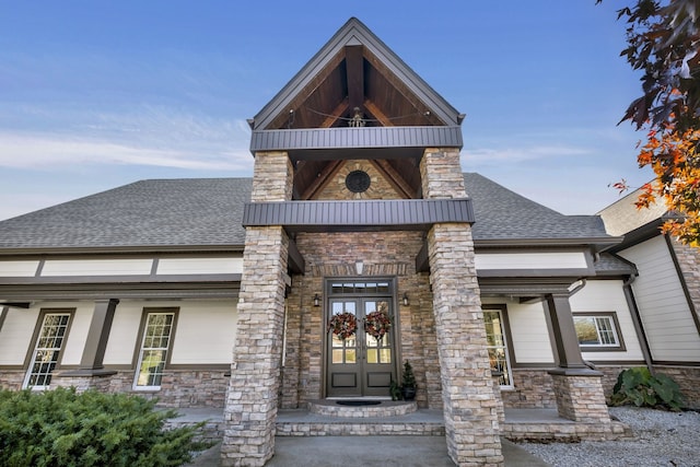 view of front of house featuring french doors and a porch