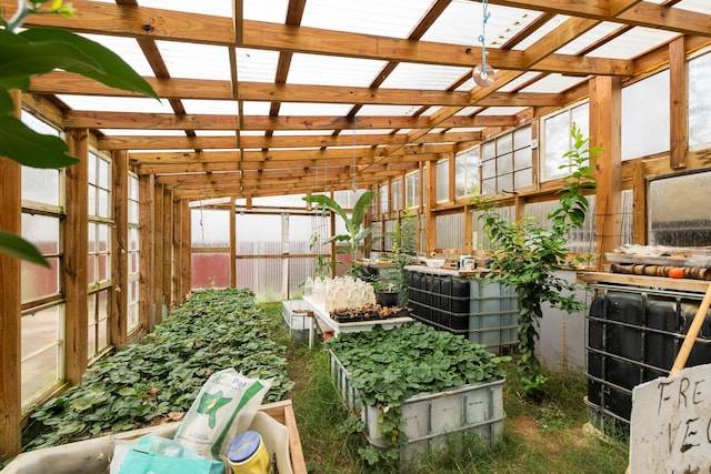 sunroom / solarium with plenty of natural light and lofted ceiling