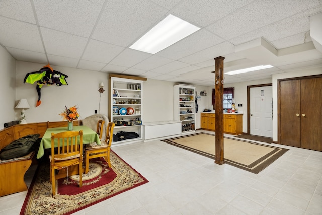 interior space featuring a paneled ceiling