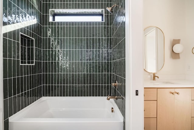 bathroom featuring tub / shower combination and vanity